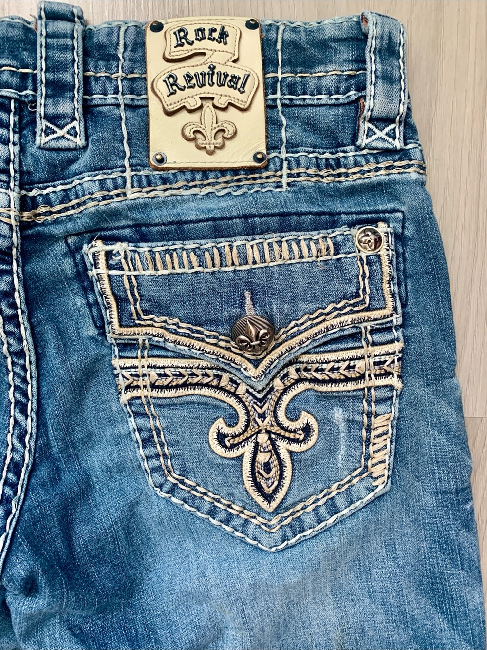 Rock Revival Wynton Slim Boot Cut Blue Denim Jeans with Cream Embroidered Pocket